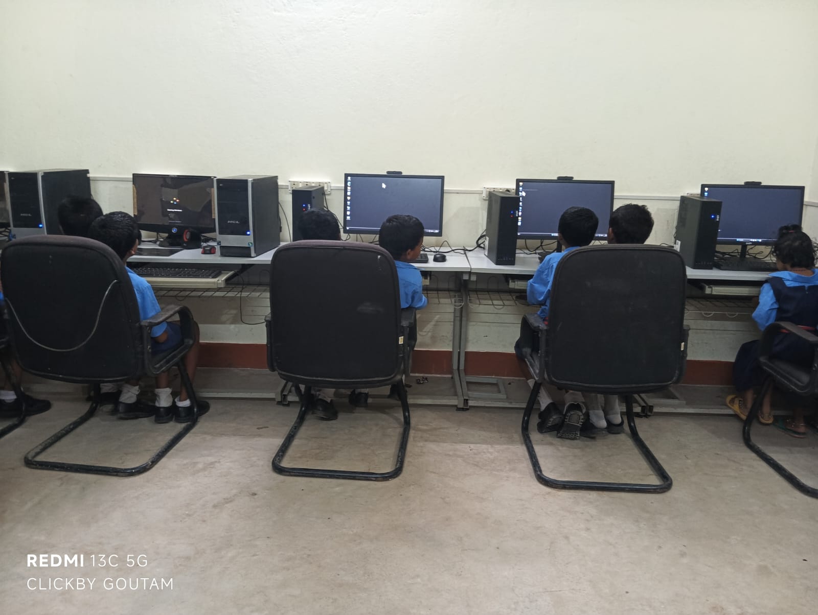Group of trainees learning computers